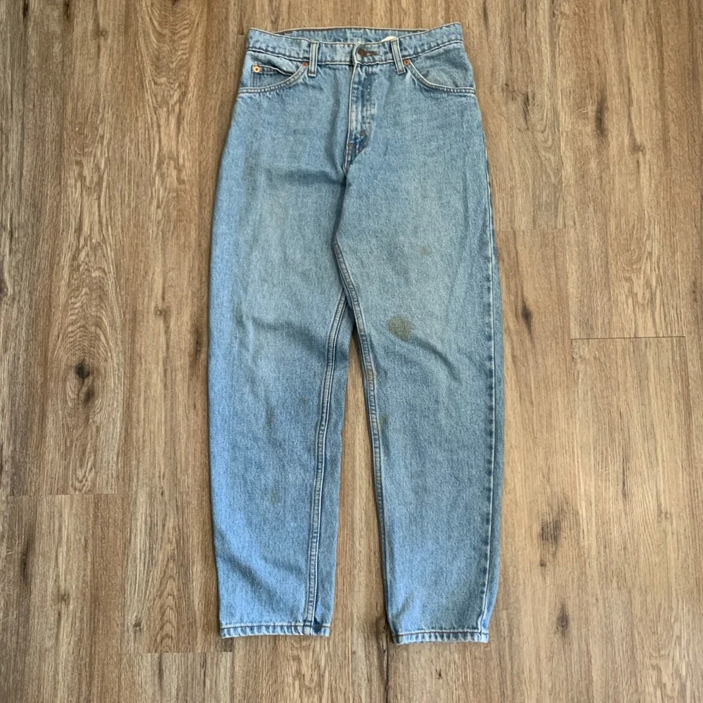 Vintage 80s Levi's 550 orange tab tapered leg denim jeans in light wash - 30x30‎